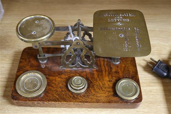 A set of postal scales and a set of apothecary scales